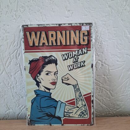 Warning! Woman at work